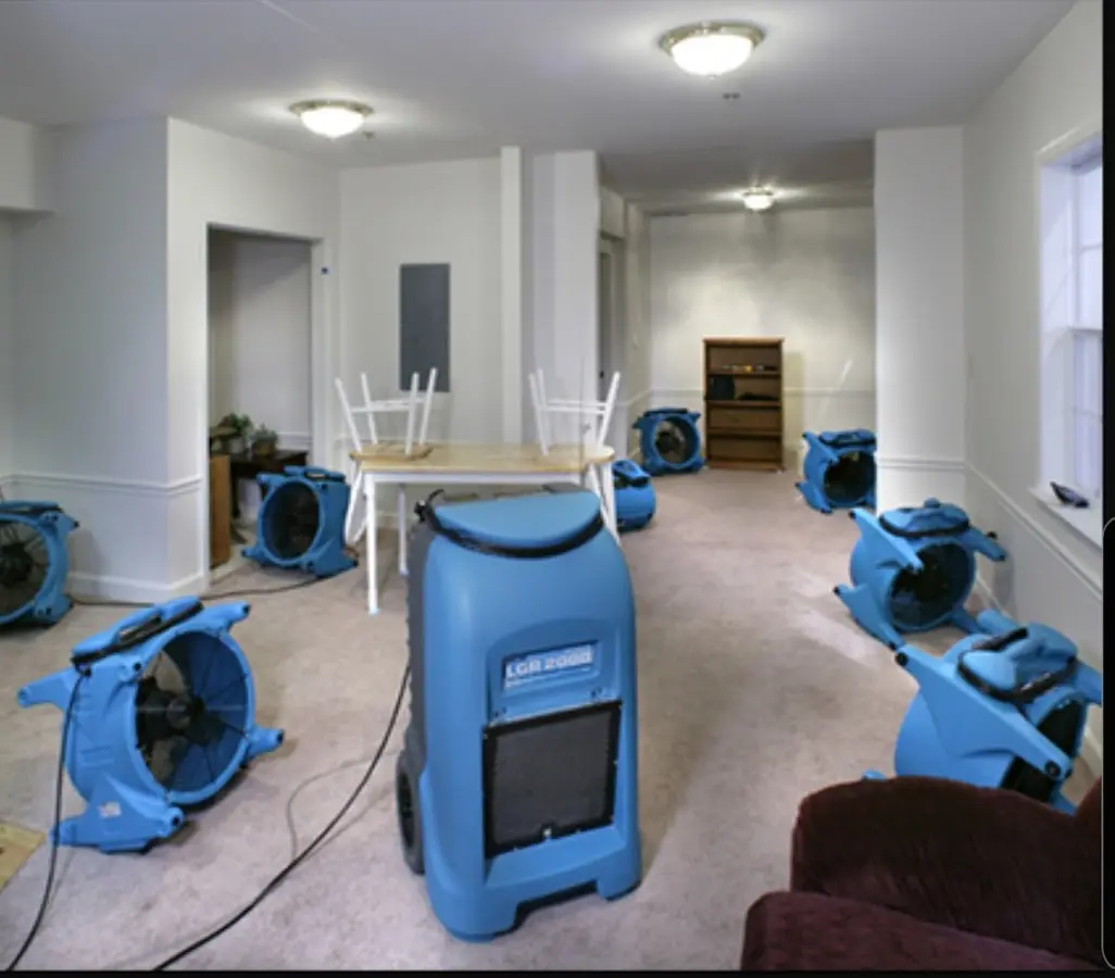 Air movers and dehumidifier setup for Water Damage Restoration in Epping